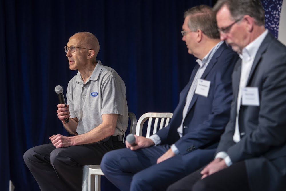 Left to right: DARPA's Peter Highnam discusses STEM workforce needs with Perspecta's Mark Westergren and Riverside Research Steve Omick. Photo: WashingtonExec