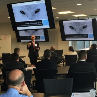 Wolf Den Associates co-Founder and Managing Director Kevin Robbins addresses the WashingtonExec Federal Business Council