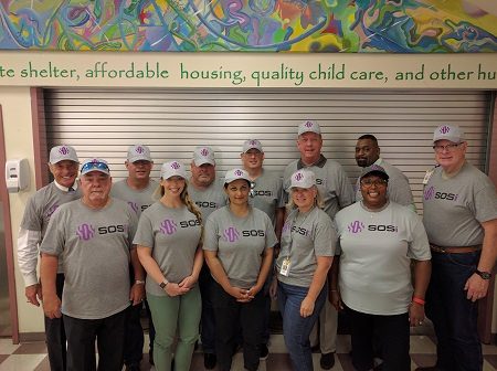 SOSi staff lend a hand at a local community center in the Washington, D.C., area