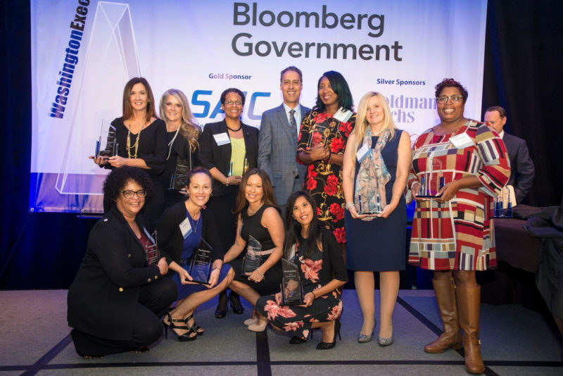 Top row, third to the right: Patrice Johnson of ASRC Federal, with her fellow EA of the Year winners and JD Kathuria